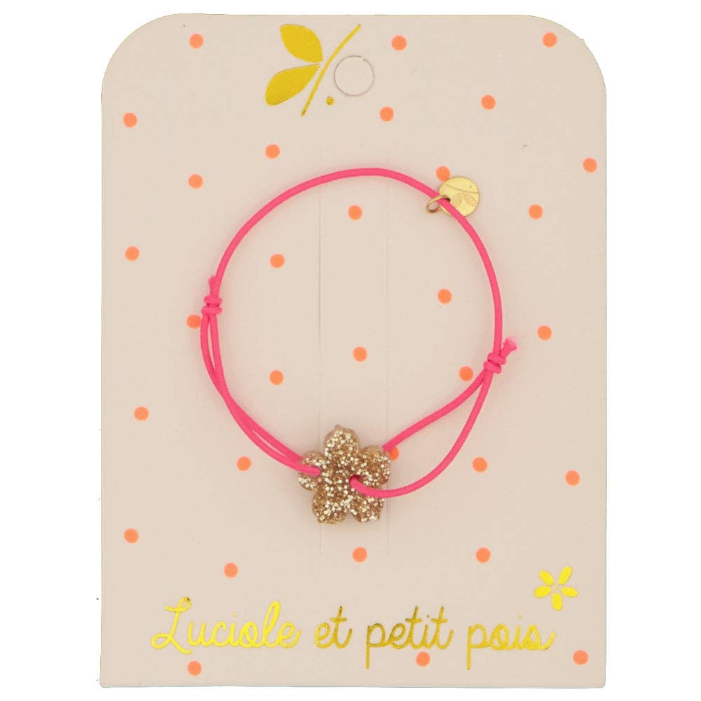 Elastic cord bracelet - fuchsia pink (gold flower)
